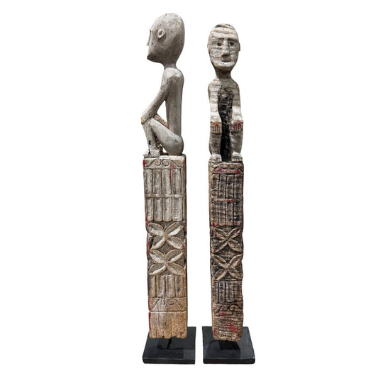 Antique Flores Ana Deo Ancestor Figures, Hand-Carved Wood with Traces of Original Red Pigment. Powerful Guardian Forms with Honest Age and Patina. Rare Tribal Pair Mounted on Iron Base for the Discerning Collector (3Lx3Wx19.5H each piece)