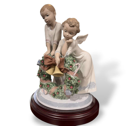 "A Heavenly Christmas" Hand-painted Porcelain Figurine by: Lladro #1863 9Lx8Wx12H Included Wood Base & Box