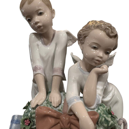 "A Heavenly Christmas" Hand-painted Porcelain Figurine by: Lladro #1863 9Lx8Wx12H Included Wood Base & Box