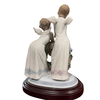"A Heavenly Christmas" Hand-painted Porcelain Figurine by: Lladro #1863 9Lx8Wx12H Included Wood Base & Box