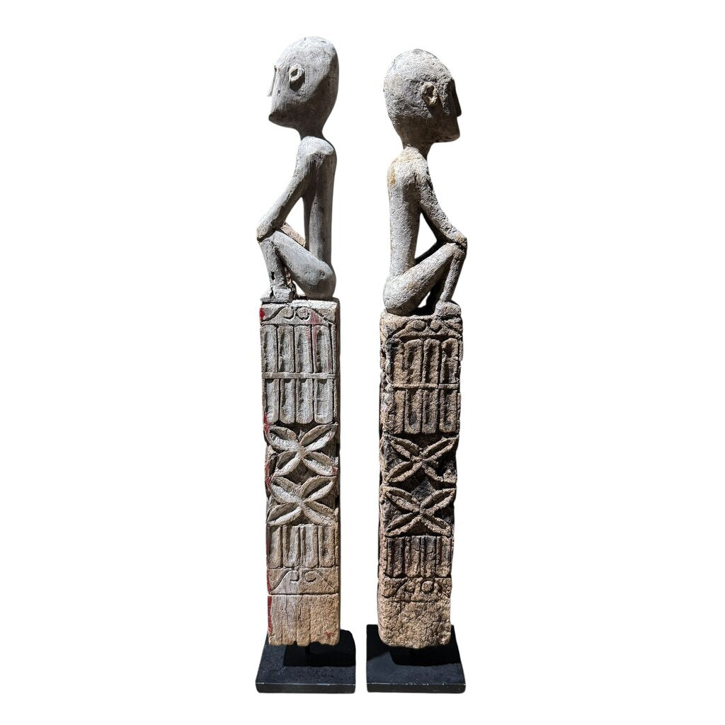 Antique Flores Ana Deo Ancestor Figures, Hand-Carved Wood with Traces of Original Red Pigment. Powerful Guardian Forms with Honest Age and Patina. Rare Tribal Pair Mounted on Iron Base for the Discerning Collector (3Lx3Wx19.5H each piece)