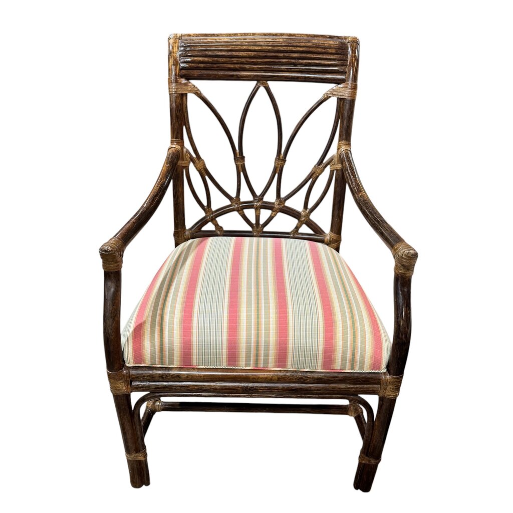 Classic British Colonial–Style Rattan Armchair With Graceful Fan Back And Hand-Wrapped Joints. Finished In A Rich, Warm Stain With A Freshly Upholstered Striped Cushion In Soft Coastal Tones.