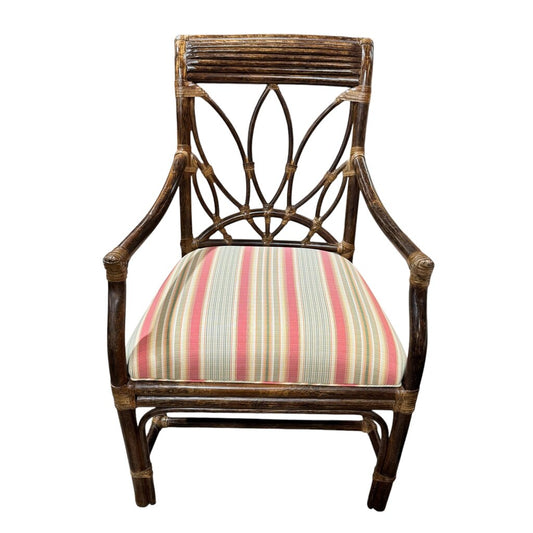 Classic British Colonial–Style Rattan Armchair With Graceful Fan Back And Hand-Wrapped Joints. Finished In A Rich, Warm Stain With A Freshly Upholstered Striped Cushion In Soft Coastal Tones.