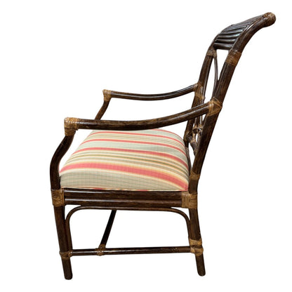 Classic British Colonial–Style Rattan Armchair With Graceful Fan Back And Hand-Wrapped Joints. Finished In A Rich, Warm Stain With A Freshly Upholstered Striped Cushion In Soft Coastal Tones.